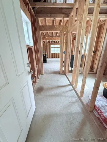 a view of a room with wooden walls