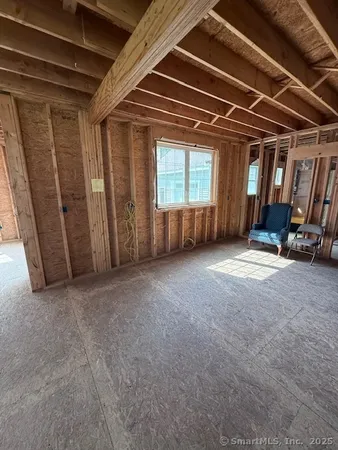 a view of empty room with windows