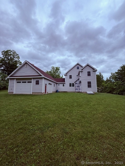 15 Suffield Street Windsor Locks, CT 06096 - Photo 7 of 32 a view of a big house with a big yard and large trees