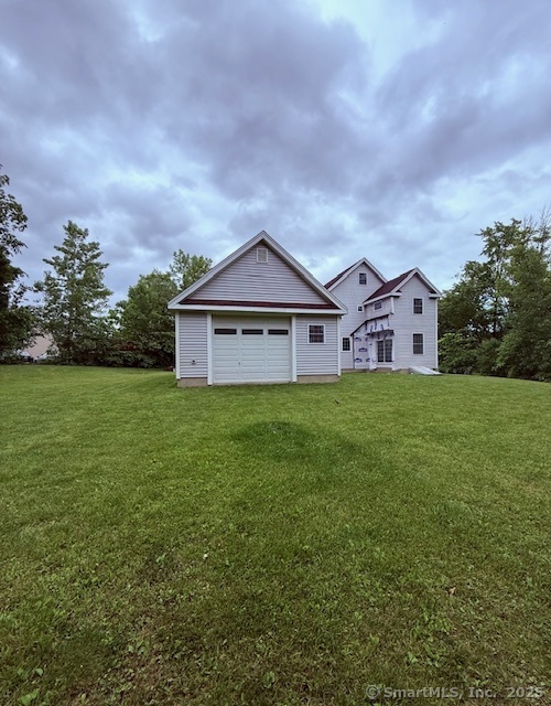 15 Suffield Street Windsor Locks, CT 06096 - Photo 9 of 32 a view of a house with a big yard and large tree