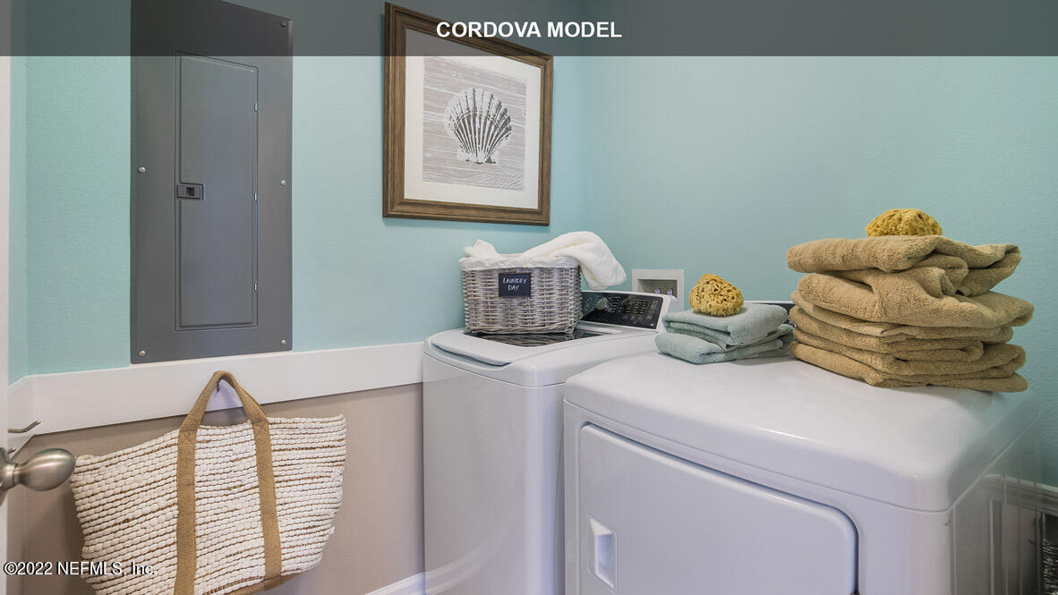 65680 Edgewater Drive Yulee, FL 32097 - Photo 19 of 48 a utility room with dryer and washer