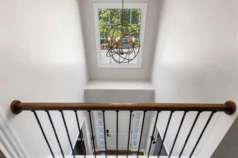 a view of storage and utility room with washer and dryer