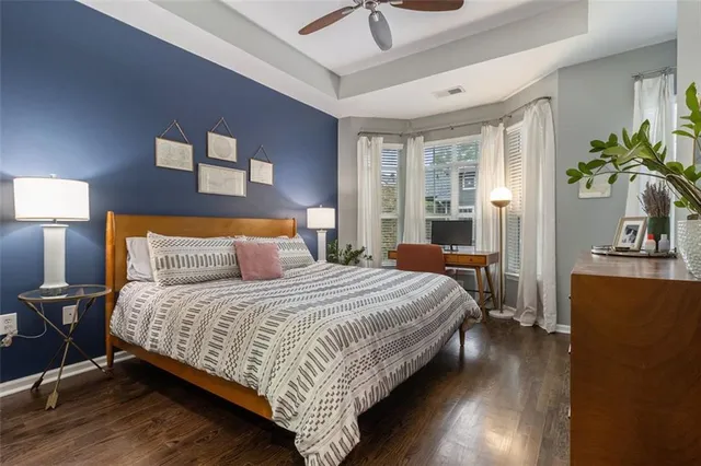 a bedroom with bed and window