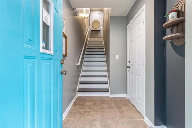 a view of an entryway with staircase