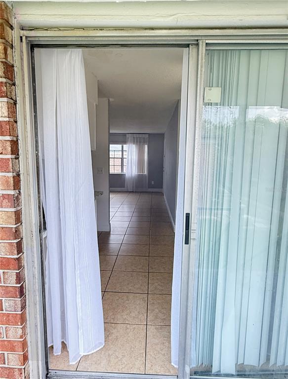 5325 Curry Ford Road, Unit G202 Orlando, FL 32812 - Photo 12 of 16 a view of a hallway