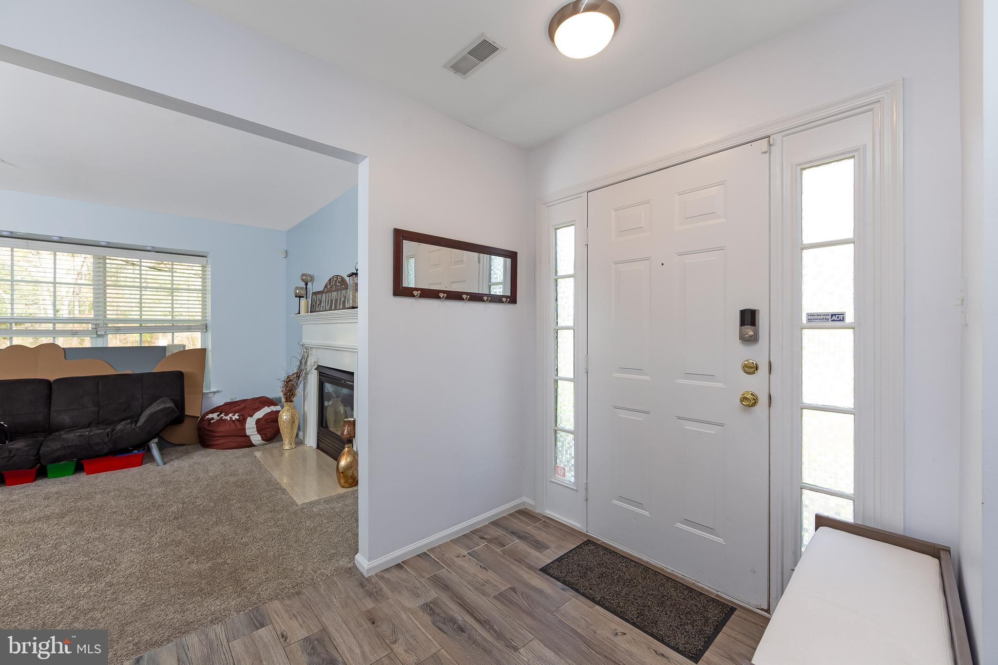 803 Tanglewood Drive Sicklerville, NJ 08081 - Photo 4 of 34 a view of a livingroom with furniture and windows