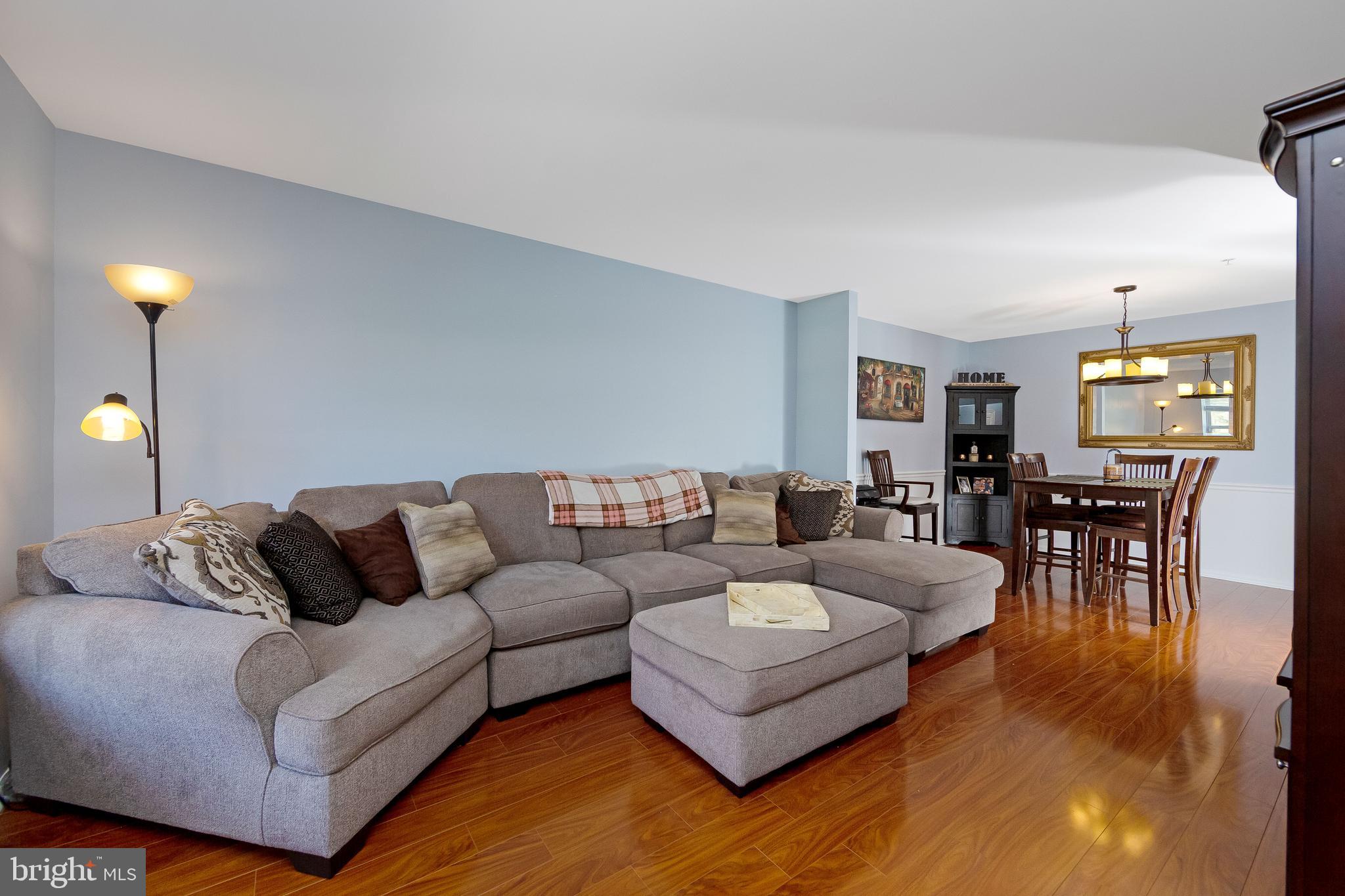 803 Tanglewood Drive Sicklerville, NJ 08081 - Photo 5 of 34 a living room with furniture and wooden floor