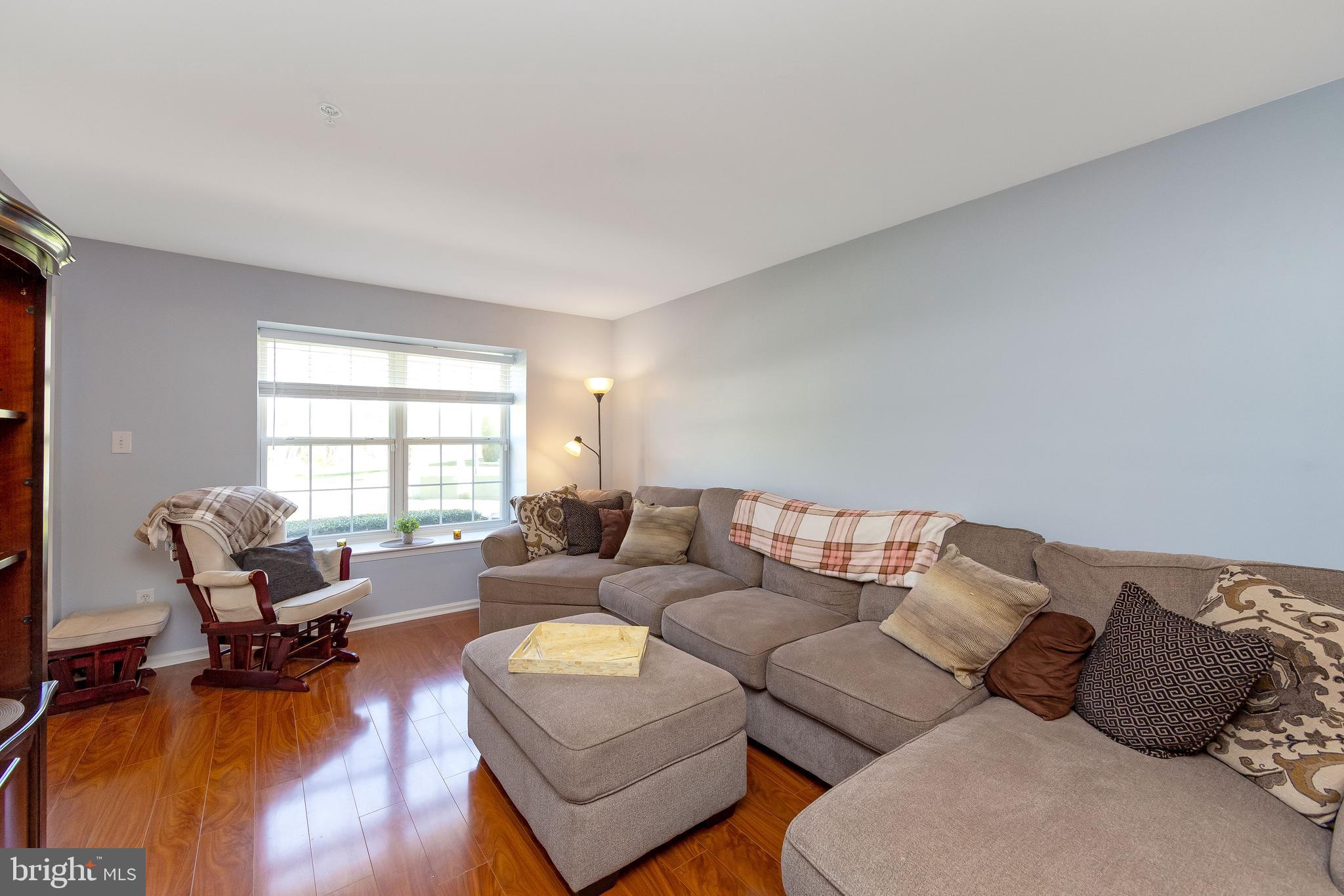 803 Tanglewood Drive Sicklerville, NJ 08081 - Photo 6 of 34 a living room with furniture and a wooden floor