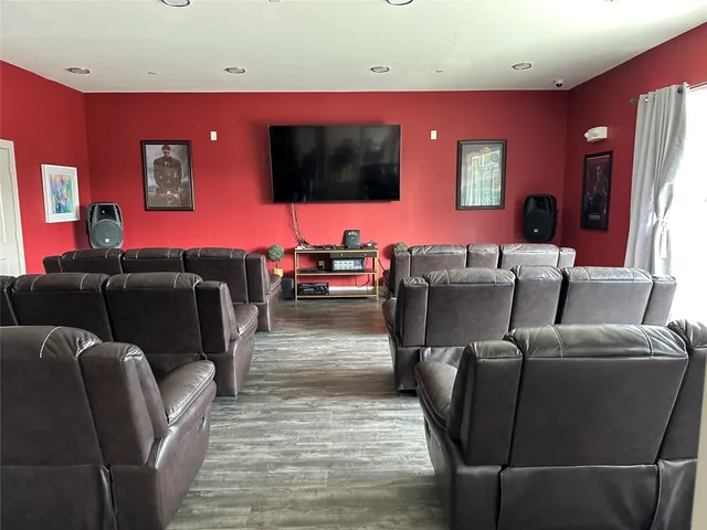 a kitchen with lots of counter top space and wooden floor
