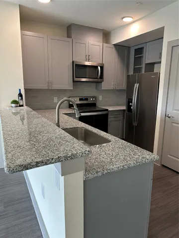 a utility room with washer and dryer