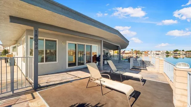 a view of a swimming pool with a lounge chair