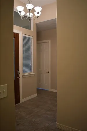 a view of a chandelier in a bathroom