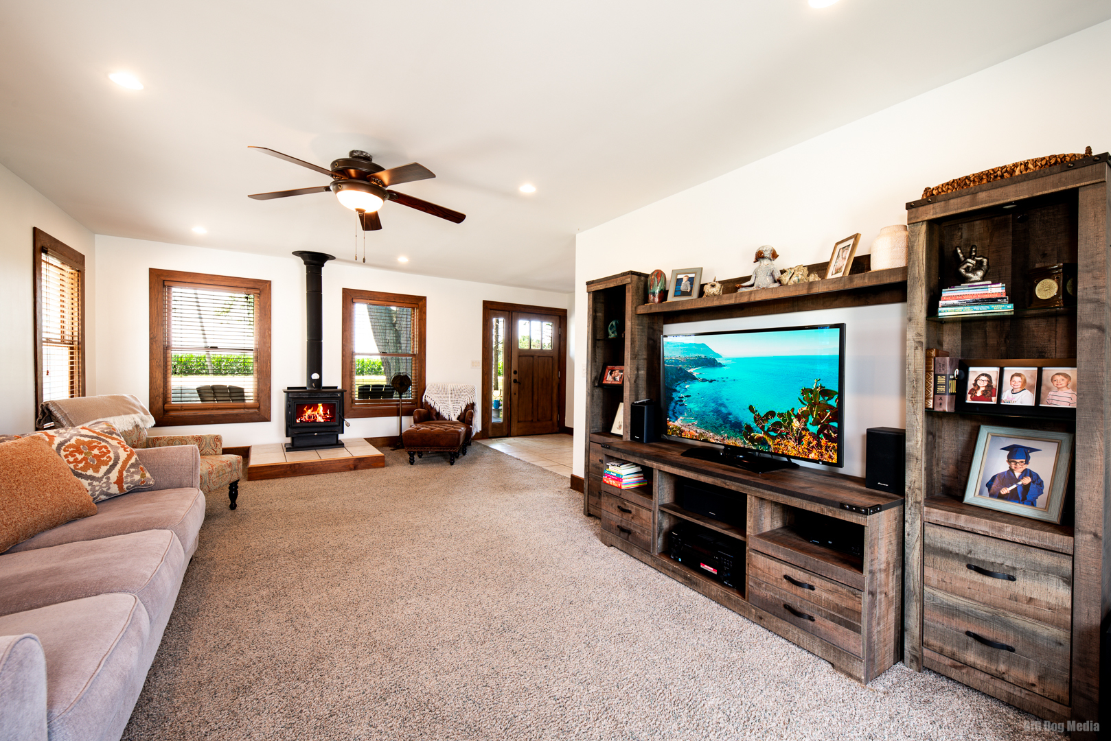 1921 West 2000S Road Kankakee, IL 60901 - Photo 7 of 37 a living room with furniture and a flat screen tv