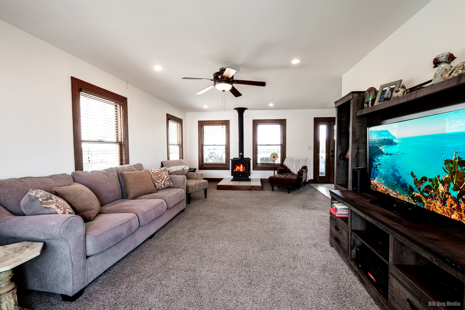 1921 West 2000S Road Kankakee, IL 60901 - Photo 8 of 37 a living room with furniture and a flat screen tv