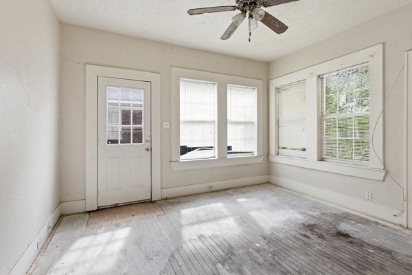 1655 Hawthorne Street Houston, TX 77006 - Photo 13 of 39 a view of an empty room with a window