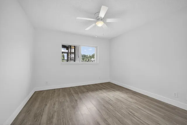 a view of a livingroom with wooden floor