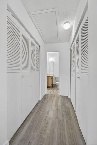 an aerial view of a house with table and chairs