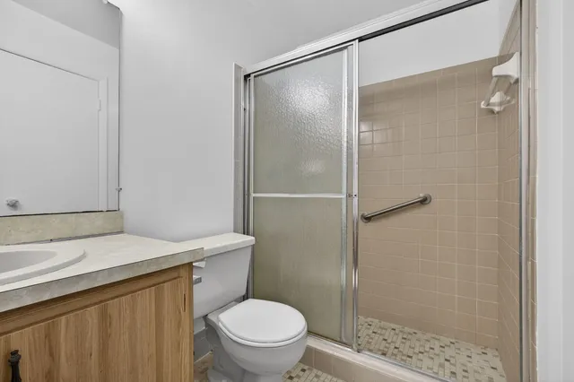 an aerial view of a city with lots of residential buildings