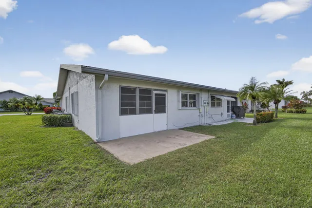 a view of a park with of a house