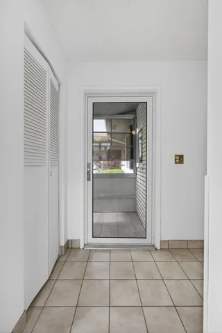 a kitchen with cabinets stainless steel appliances and wooden cabinets