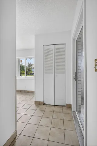a kitchen with stainless steel appliances a stove a sink and a microwave