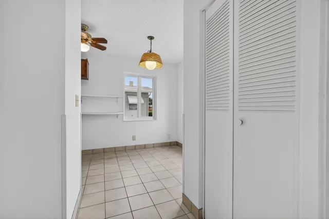 a kitchen with a sink a stove and refrigerator