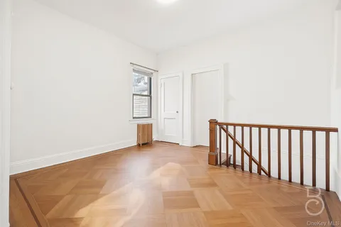 a view of a livingroom with a staircase