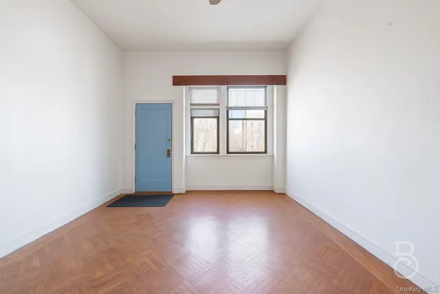 an empty room with windows