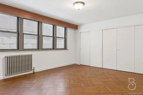 en empty room with windows