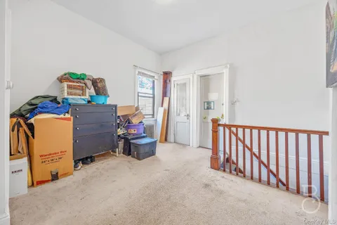 a room with furniture and a window