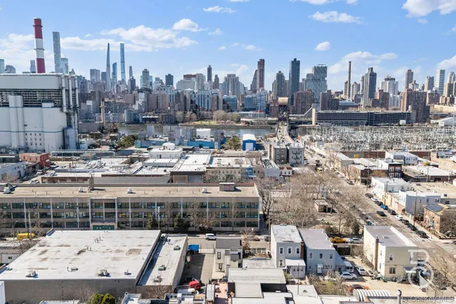 a view of a chairs with wooden fence