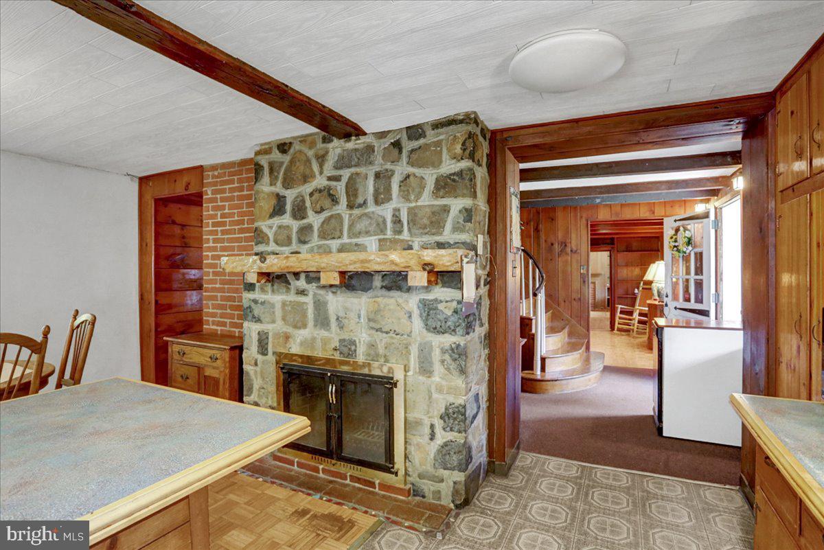535 Snyder Road Perkiomenville, PA 18074 - Photo 12 of 54 Stone fireplace in kitchen