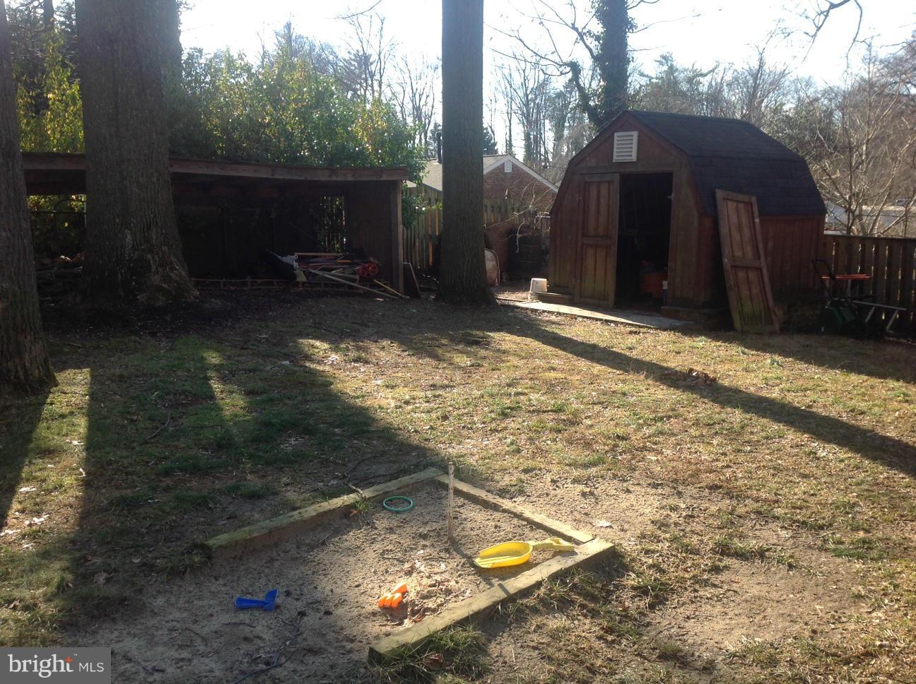 7125 Catlett Street Springfield, VA 22151 - Photo 22 of 26 a view of a backyard of the house