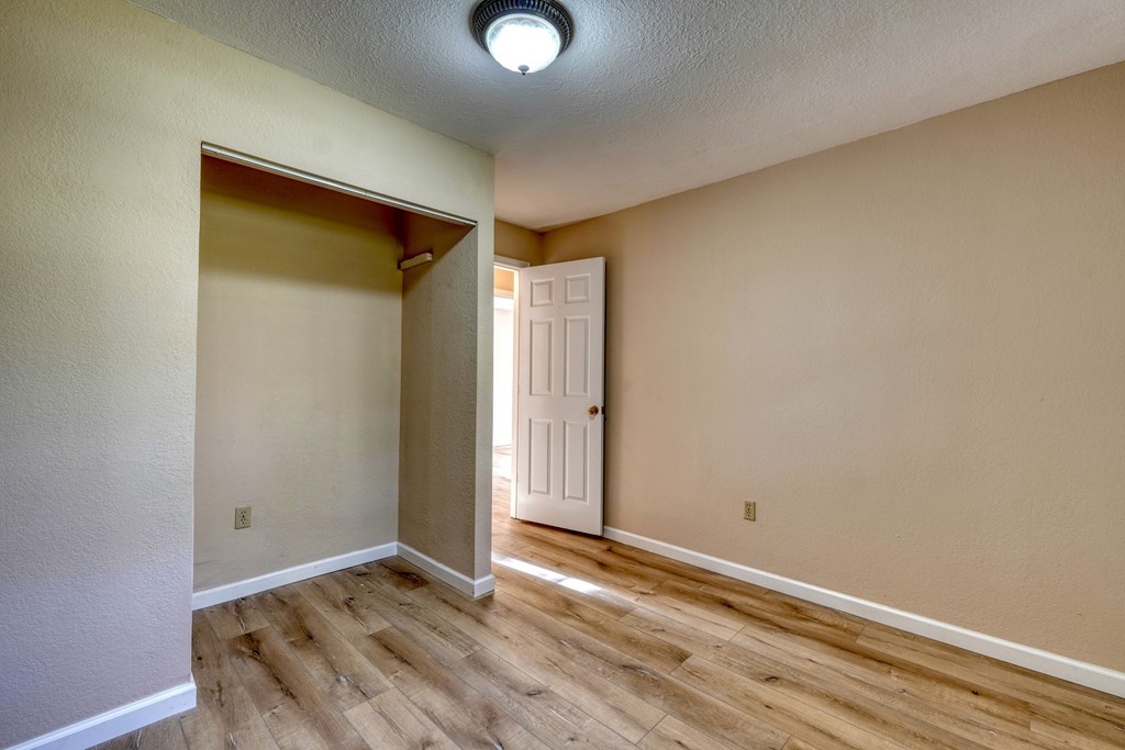 110 Johnson Road Hayesville, NC 28904 - Photo 17 of 41 an empty room with wooden floor and closet
