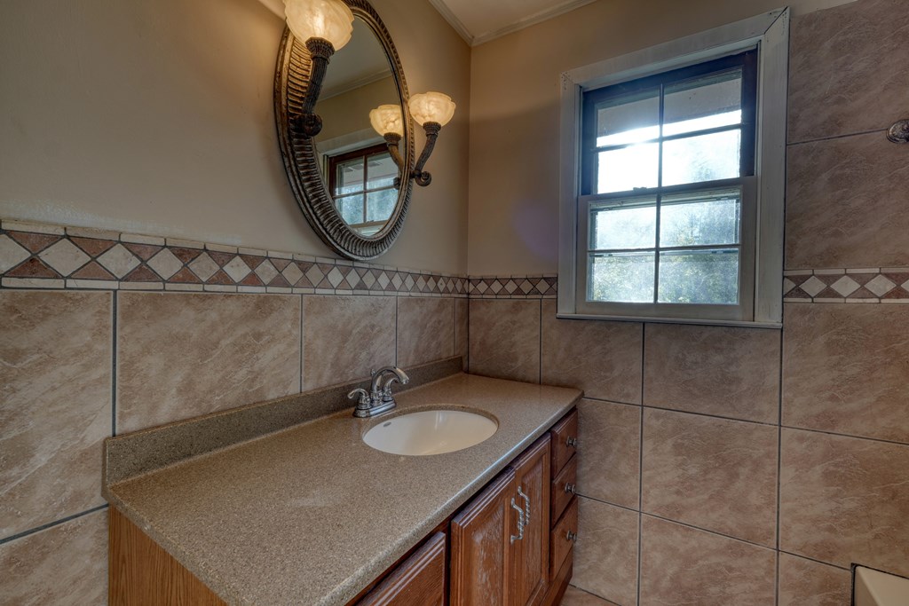 110 Johnson Road Hayesville, NC 28904 - Photo 19 of 41 a bathroom with a sink and a mirror