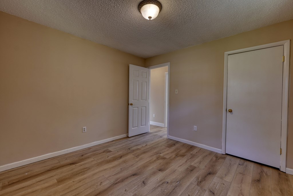 110 Johnson Road Hayesville, NC 28904 - Photo 21 of 41 a view of an empty room and wooden floor