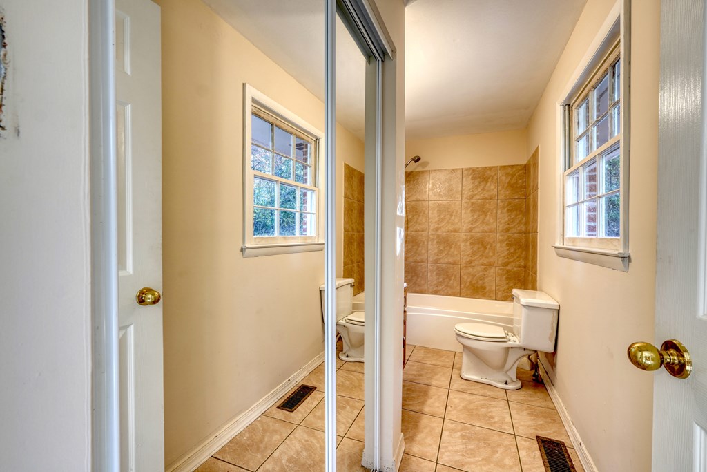 110 Johnson Road Hayesville, NC 28904 - Photo 25 of 41 a bathroom with a window and a shower