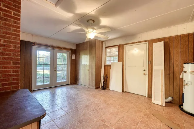 a view of livingroom with hardwood floor and a ceiling fan