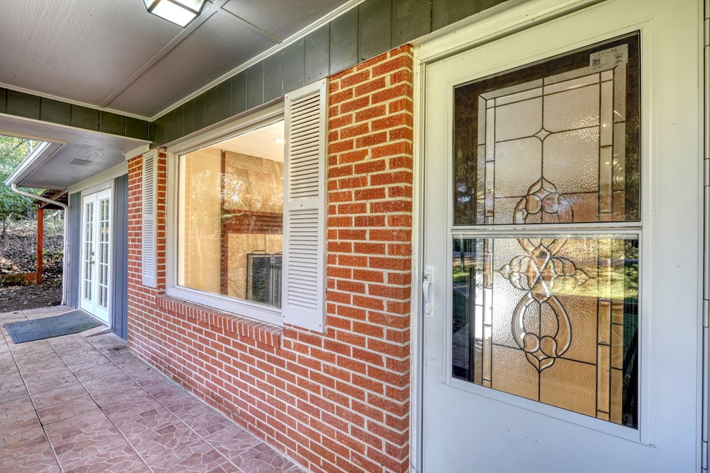 110 Johnson Road Hayesville, NC 28904 - Photo 4 of 41 a view of a door and a window