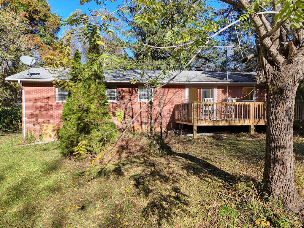 110 Johnson Road Hayesville, NC 28904 - Photo 6 of 41 a view of a backyard with a tree