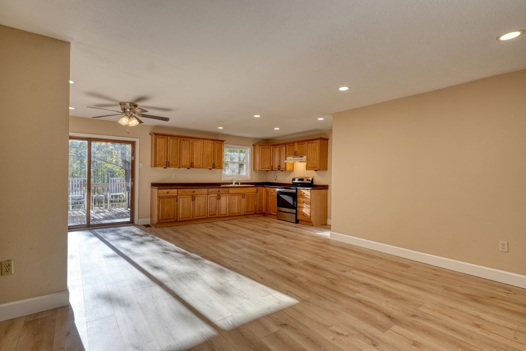 110 Johnson Road Hayesville, NC 28904 - Photo 10 of 41 a big room with wooden floor and windows