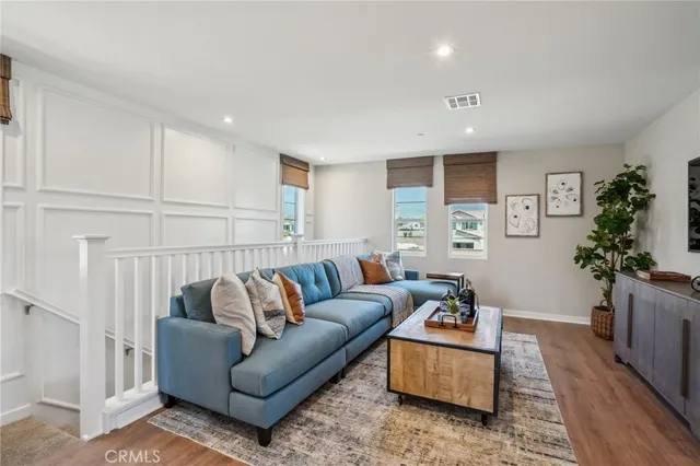a living room with furniture and a couch
