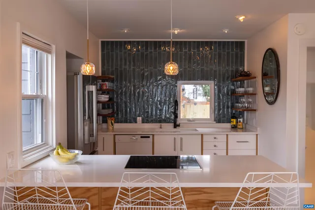 a living room with furniture and window