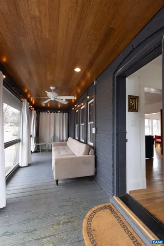 a bathroom with a sink mirror vanity and toilet
