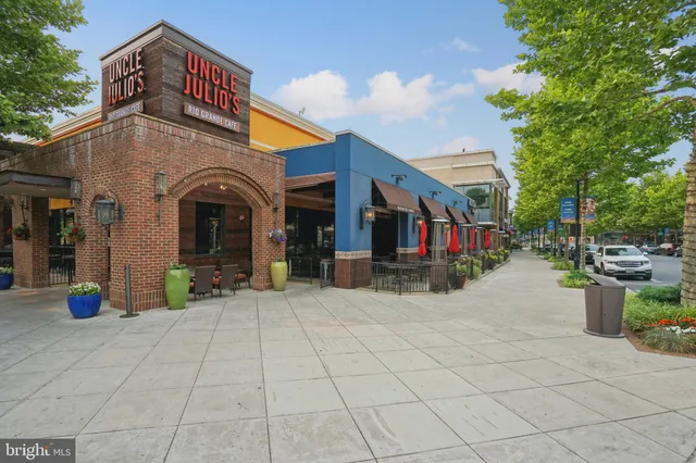 an aerial view of a city with lots of residential buildings