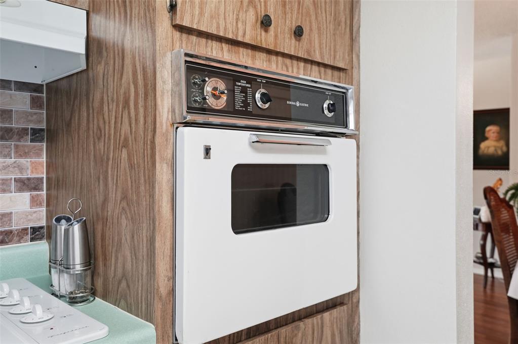 7329 Cay Drive Port Richey, FL 34668 - Photo 11 of 38 a close view of a stove top oven and sink