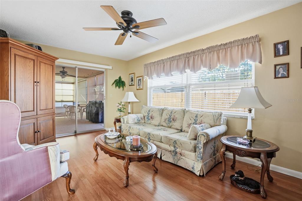 7329 Cay Drive Port Richey, FL 34668 - Photo 19 of 38 a living room with furniture and a large window
