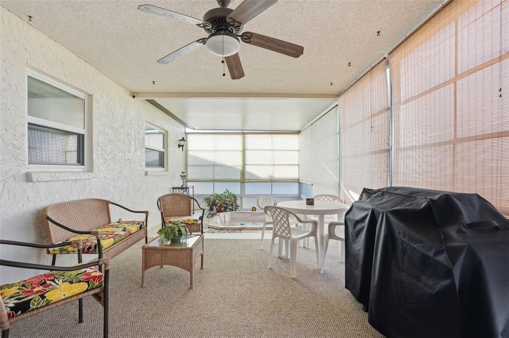 7329 Cay Drive Port Richey, FL 34668 - Photo 30 of 38 a bedroom with furniture and a window