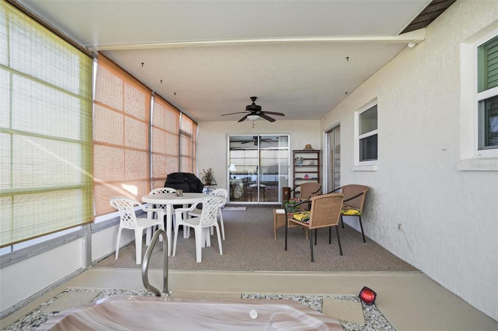 7329 Cay Drive Port Richey, FL 34668 - Photo 34 of 38 a view of a dining room with furniture and chandelier