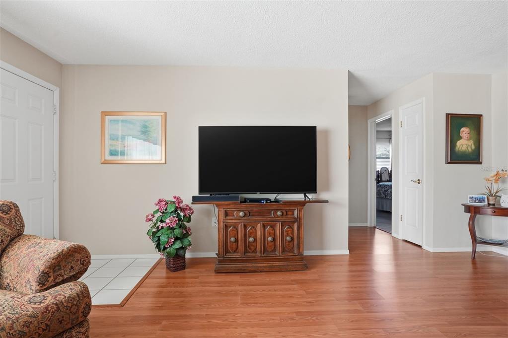 7329 Cay Drive Port Richey, FL 34668 - Photo 6 of 38 a living room with furniture and a flat screen tv